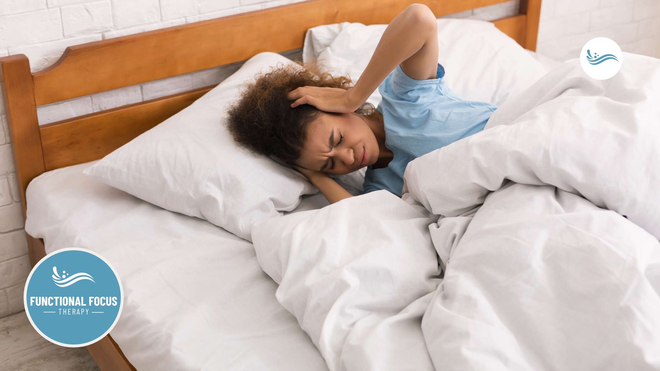 A woman in bed dealing with sensory overload